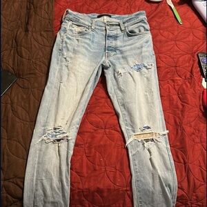 Distressed Light Blue Jeans